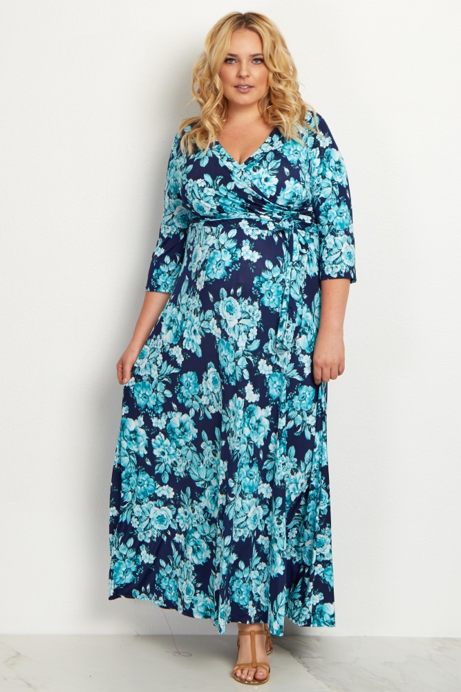 A floral printed plus size maxi dress. V-neckline. Cinched under bust. Sash tie. 3/4 sleeves.