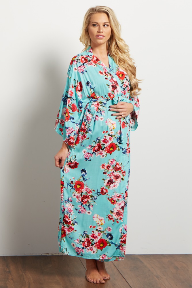 A floral printed long dressing robe. Open front with tie closure.