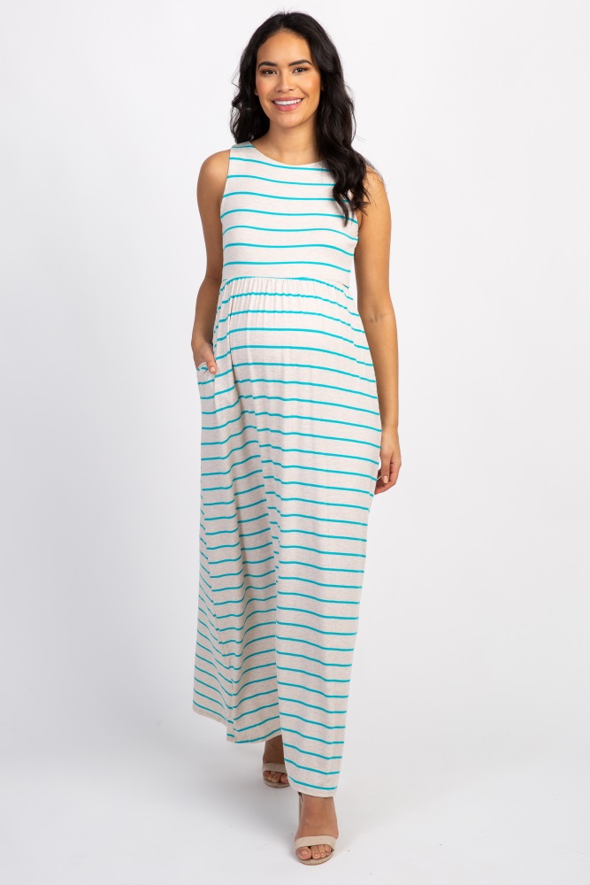 Striped sleeveless maxi dress. Rounded neckline. Top double lined to prevent sheerness.