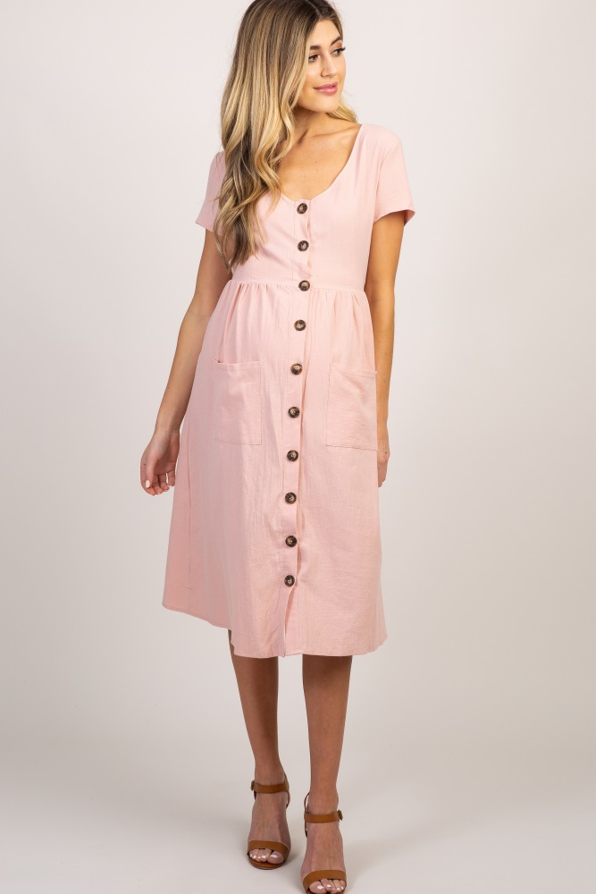 pink button front dress