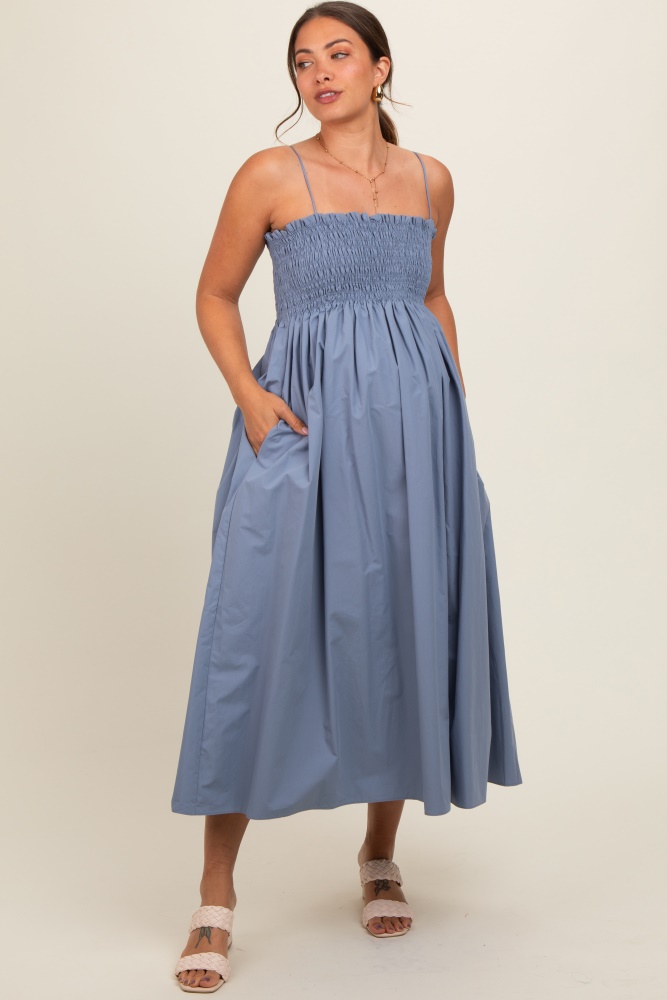 blue smocked pocketed maternity midi dress