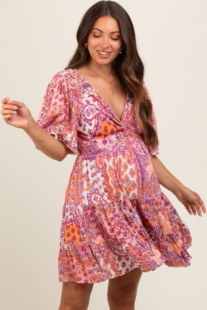 peach paisley twist front short sleeve maternity dress