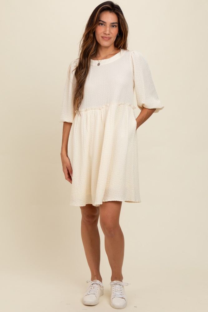 cream knit ruffle trim dress