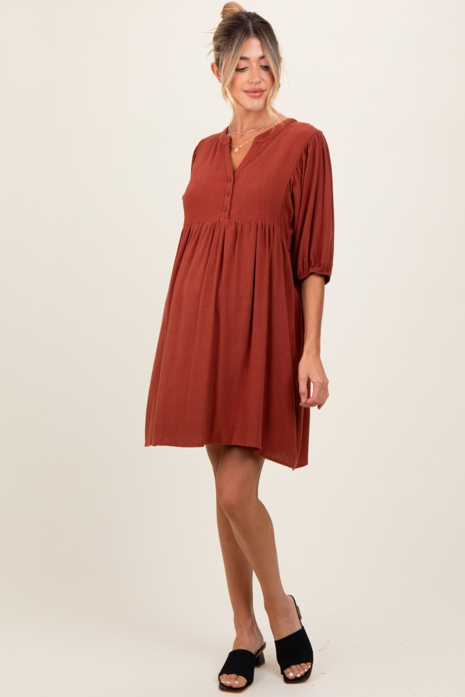 rust button up split neck maternity dress