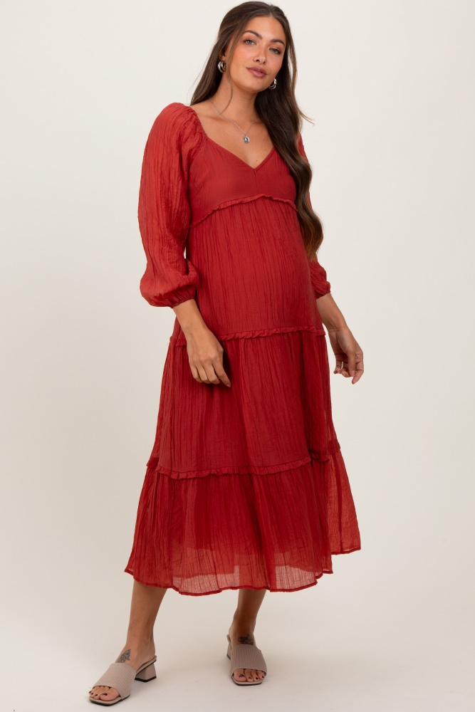 rust ruffle accent tiered long sleeve maternity maxi dress