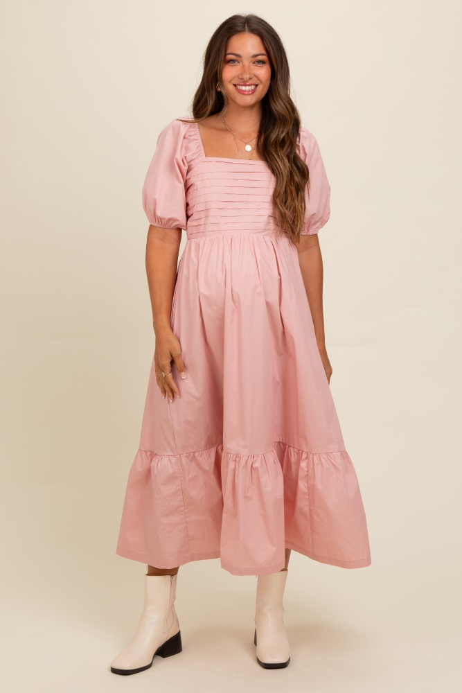 light pink pleated bodice puff sleeve maternity midi dress