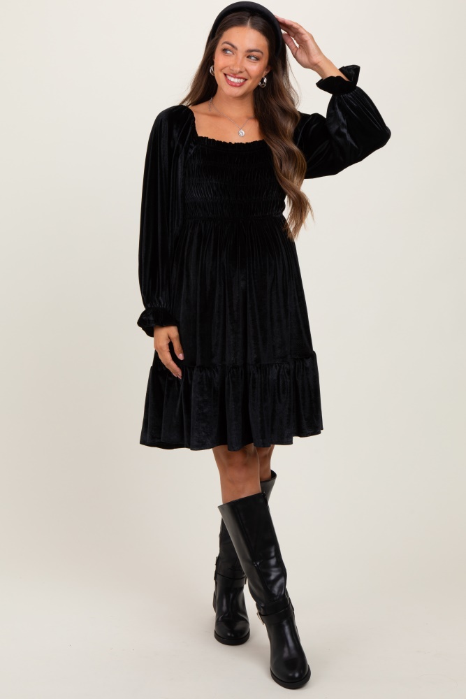 black velvet smocked long sleeve maternity dress