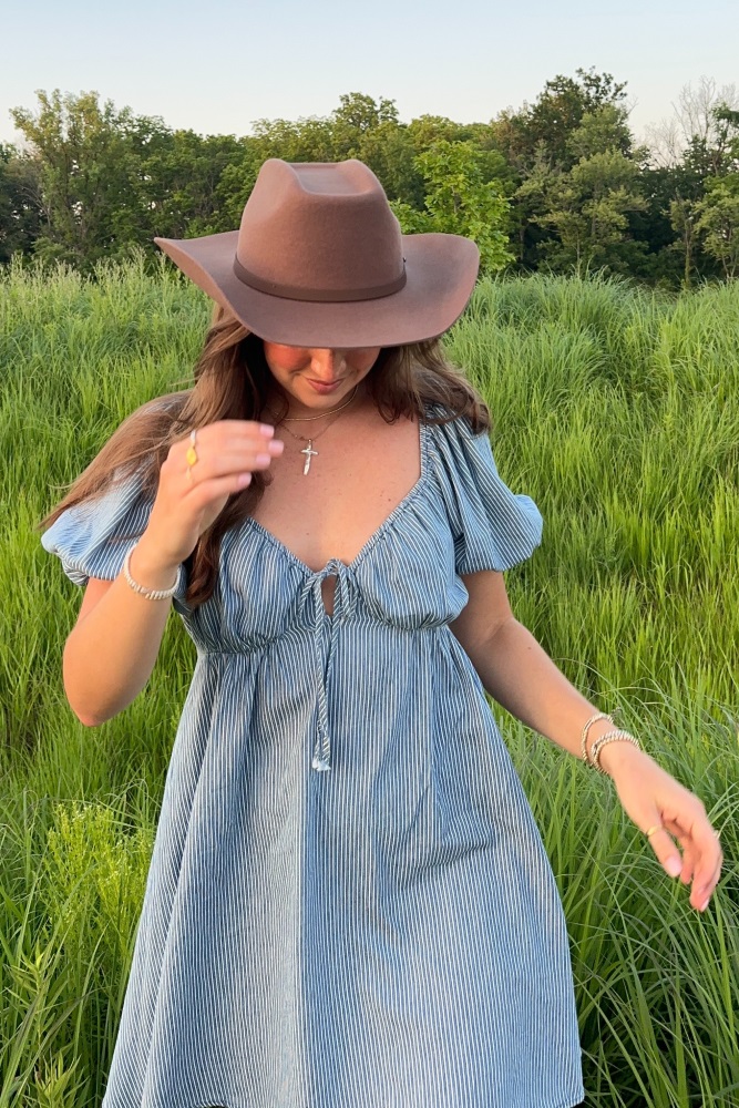 front tie mini dress Blue Striped Chambray while the feminine silhouette keeps the overall feel polished and special Draped Front Tie Back Mini