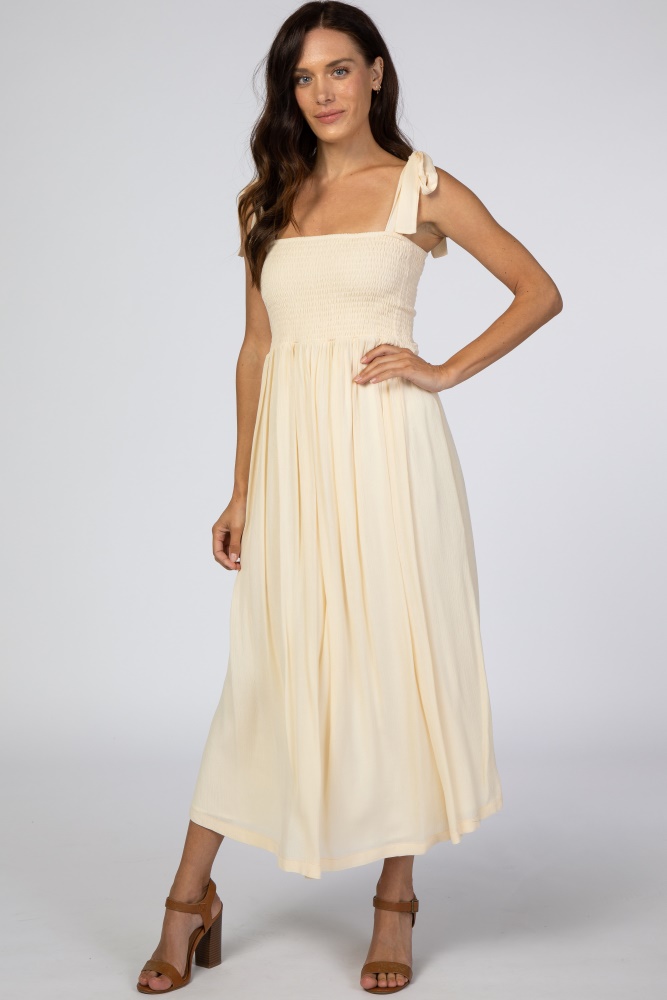 beige smocked tie strap midi dress