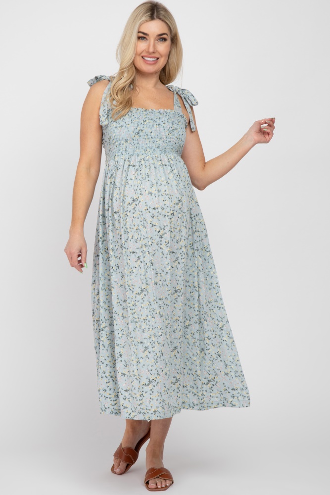 light blue floral smocked tie strap maternity midi dress