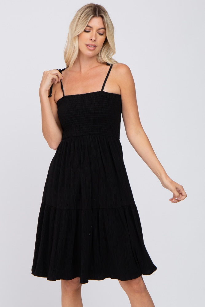 black smocked shoulder tie dress