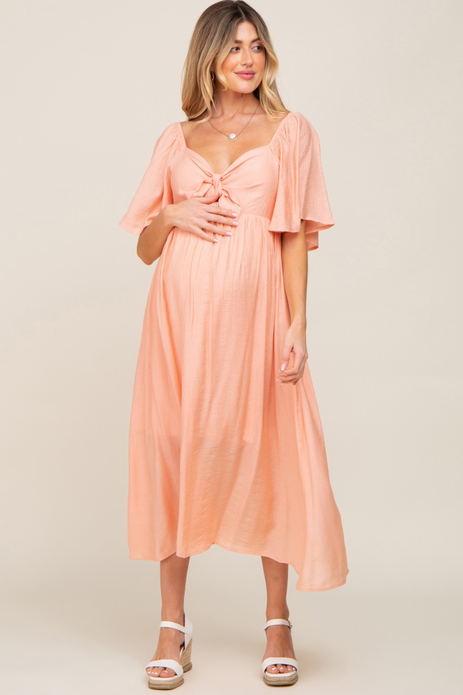 peach front tie ruffle sleeve maternity midi dress