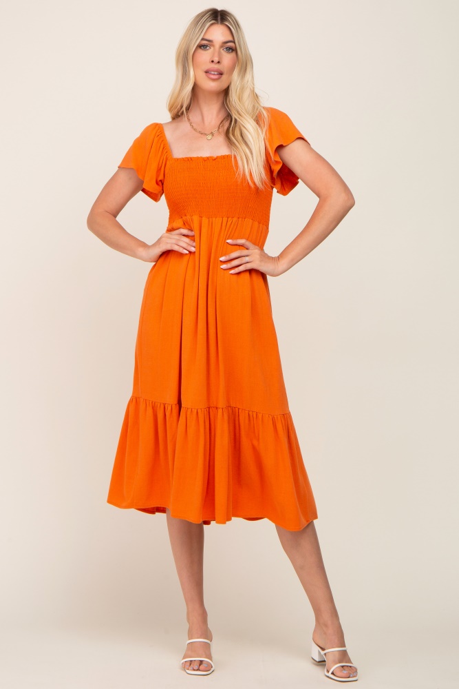 orange smocked ruffle hem midi dress