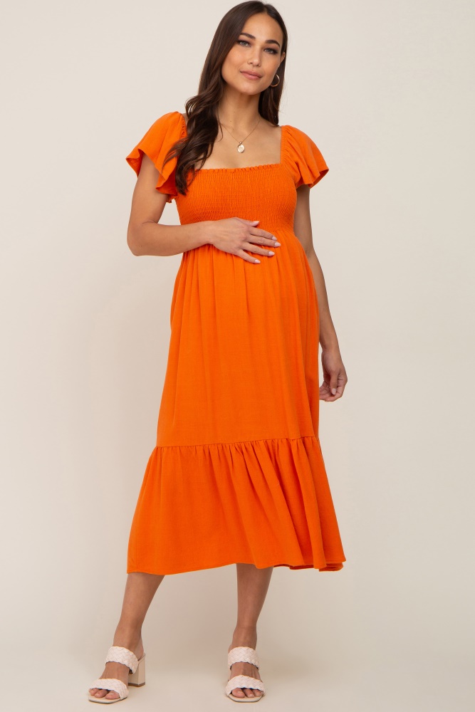 orange smocked ruffle hem maternity midi dress