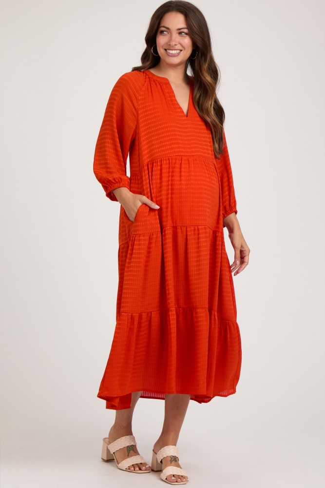 orange textured tiered maternity midi dress