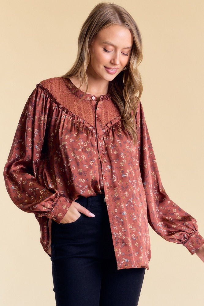rust frilled floral blouse