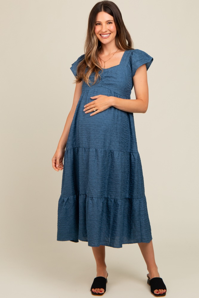 blue textured sweetheart neck short puff sleeve tiered maternity midi dress